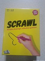 Front of Scrawl game box showing title and artwork