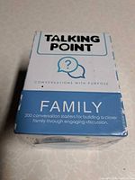 Front of sealed Talking Point Family card box