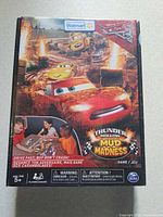 Front of sealed Thunder Hollow Mud Madness board game box