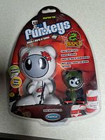 Front view of sealed UB Funkeys Hidden Realm Starter Kit showing two figures