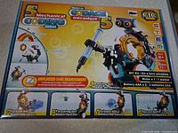 Front of box showing model name, age rating and battery requirements