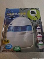 Front of retail box showing product image, capacity and color options