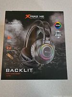 Front of sealed box showing headset image and RGB feature