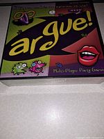 Front of sealed Argue! game box