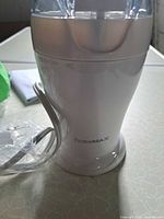 front view of grinder with power cord visible