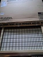 Boxed North States pet gate showing product and packaging