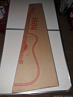 Cardboard box with NOVA branding