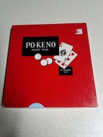 Front of red PO-KE-NO box showing branding and 12-board set label