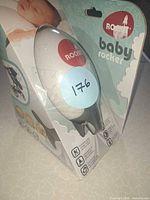 Front of retail box showing Rockit baby rocker unit