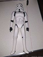 Full view of 24" Stormtrooper figure lying flat on tabletop