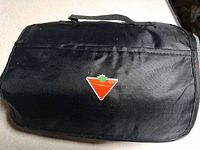 Black nylon carrying case with Canadian Tire logo and handle