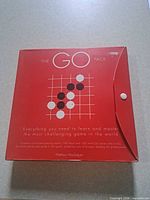 Front of red "The GO Pack" box showing logo and design