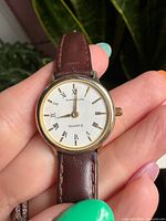 Front view showing dial, bezel and strap