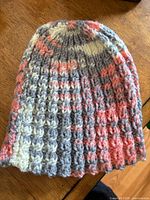 Front view of ribbed beanie showing colour pattern