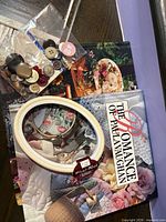 Overview of books, buttons bag and flexi hoop