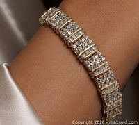 Bracelet worn on wrist showing overall design and scale