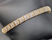 Full bracelet laid flat on display pad