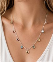 Necklace worn on model showing overall look and coloured diamond stations