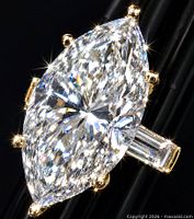 Marquise-cut diamond ring front view, showing prongs and shine