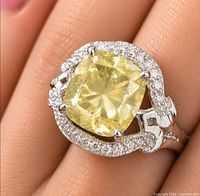Ring on finger showing overall design and proportion