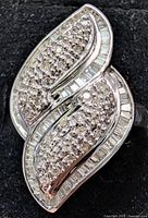 Top view showing entire ring face with pavé and baguette diamonds