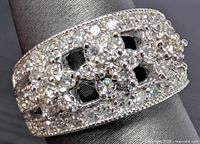 Oblique view of diamond cluster pattern on ring