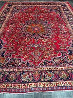 Full view of entire rug showing pattern and borders