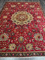 Full view of rug showing entire pattern and borders