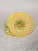 Front view of yellow buttercup Carlton Ware plate