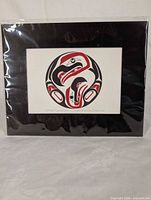 Front view of matted print in protective sleeve