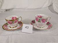 Front view of both teacup and saucer sets
