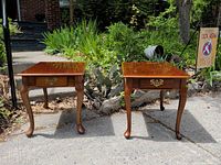 Both end tables front three-quarter view outdoors