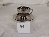 Side view of teacup on saucer