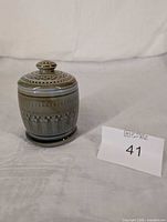 Full view of preserve pot with lid showing glaze color and pattern