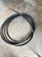 Coiled 50' black soaker hose