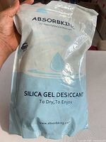 Front view of sealed AbsorbKing 500g silica gel desiccant bag