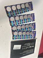 Front view of four Beidongli blister cards showing 20 CR2450 batteries