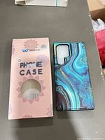 Front view of phone case and front of original box