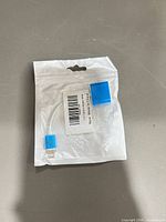 Front view of sealed pouch containing 2-in-1 Lightning audio adapter