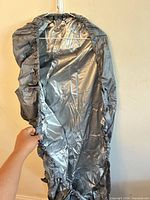 Cover front view showing satin-like polyester and elastic edges