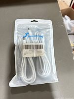 Front view of sealed Liwinting package containing white DC extension cables