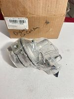 Fuel pump sealed in plastic beside original box