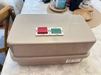 Top view showing enclosure and red/green push-buttons