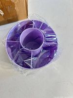 Top view of purple plastic organizer in wrap