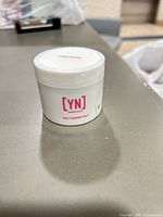 Front view of sealed Young Nails acrylic powder jar 45 g