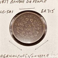Obverse view showing Banque du Peuple UN SOU wreath and holder annotations