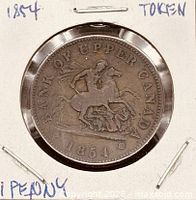 Obverse view of 1854 Bank of Upper Canada token in 2x2 holder