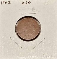 Obverse view of 1902 Indian Head cent in holder