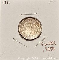 Full view of coin in 2×2 holder with .925 silver note