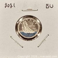 Coin in 2×2 holder showing coloured Bluenose reverse